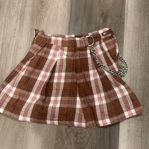 In good condition and very cute. Colors are brown white and pink